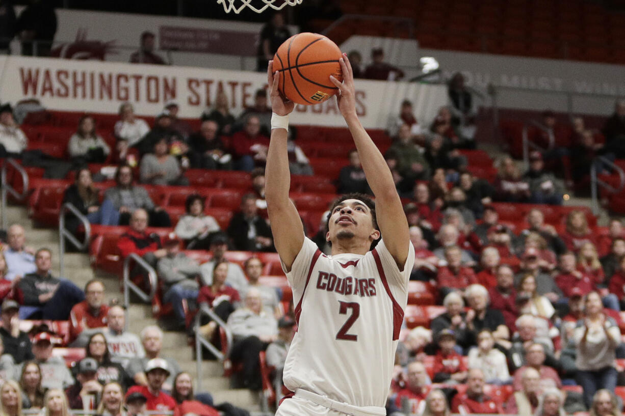 Washington State guard Myles Rice drives to the basket during the first half of the team's NCAA college basketball game against California, Thursday, Feb. 15, 2024, in Pullman, Wash.