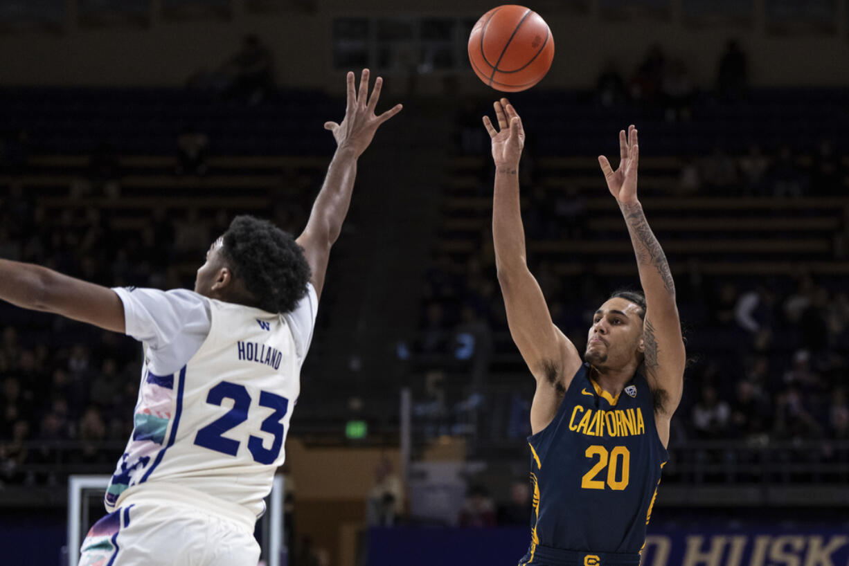 California guard Jaylon Tyson shoots the ball against Washington guard Anthony Holland during the first half of an NCAA college basketball game Saturday, Feb. 17, 2024, in Seattle.
