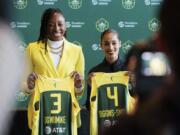 New Seattle Storm players Nneka Ogwumike (3) and Skylar Diggins-Smith (4) attend a press conference in Seattle, Monday, Feb. 19, 2024.