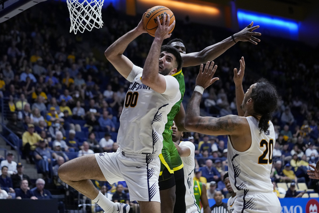 California forward Fardaws Aimaq (00) rebounds the ball during the second half of the team's NCAA college basketball game against Oregon, Saturday, Feb. 24, 2024, in Berkeley, Calif. (AP Photo/Godofredo A.