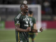 Portland Timbers defender Kamal Miller (4) celebrates his team's 4-1 win over Colorado Rapids following an MLS soccer match, Saturday, Feb. 24, 2024, in Portland, Ore.