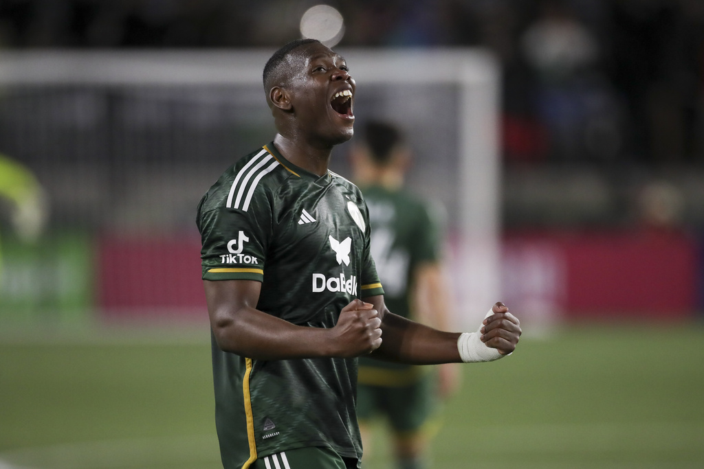 Portland Timbers defender Kamal Miller (4) celebrates his team's 4-1 win over Colorado Rapids following an MLS soccer match, Saturday, Feb. 24, 2024, in Portland, Ore.