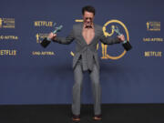Robert Downey Jr., winner of the awards for outstanding performance by a male actor in a supporting role and outstanding performance by a cast in a motion picture for &ldquo;Oppenheimer&rdquo; poses in the press room during the 30th annual Screen Actors Guild Awards on Saturday, Feb. 24, 2024, at the Shrine Auditorium in Los Angeles.