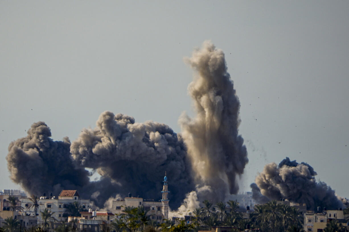 Smoke and explosion following an Israeli bombardment inside the Gaza Strip, as seen from southern Israel, Sunday, Feb. 11, 2024. The army is battling Palestinian militants across Gaza in the war ignited by Hamas&#039; Oct. 7 attack into Israel.