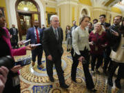 Senate Minority Leader Mitch McConnell of Ky., walks past members of the media after delivering remarks on the Senate floor, Wednesday, Feb. 28, 2024 on Capitol Hill in Washington. McConnell says he&rsquo;ll step down as Senate Republican leader in November. The 82-year-old Kentucky lawmaker is the longest-serving Senate leader in history.