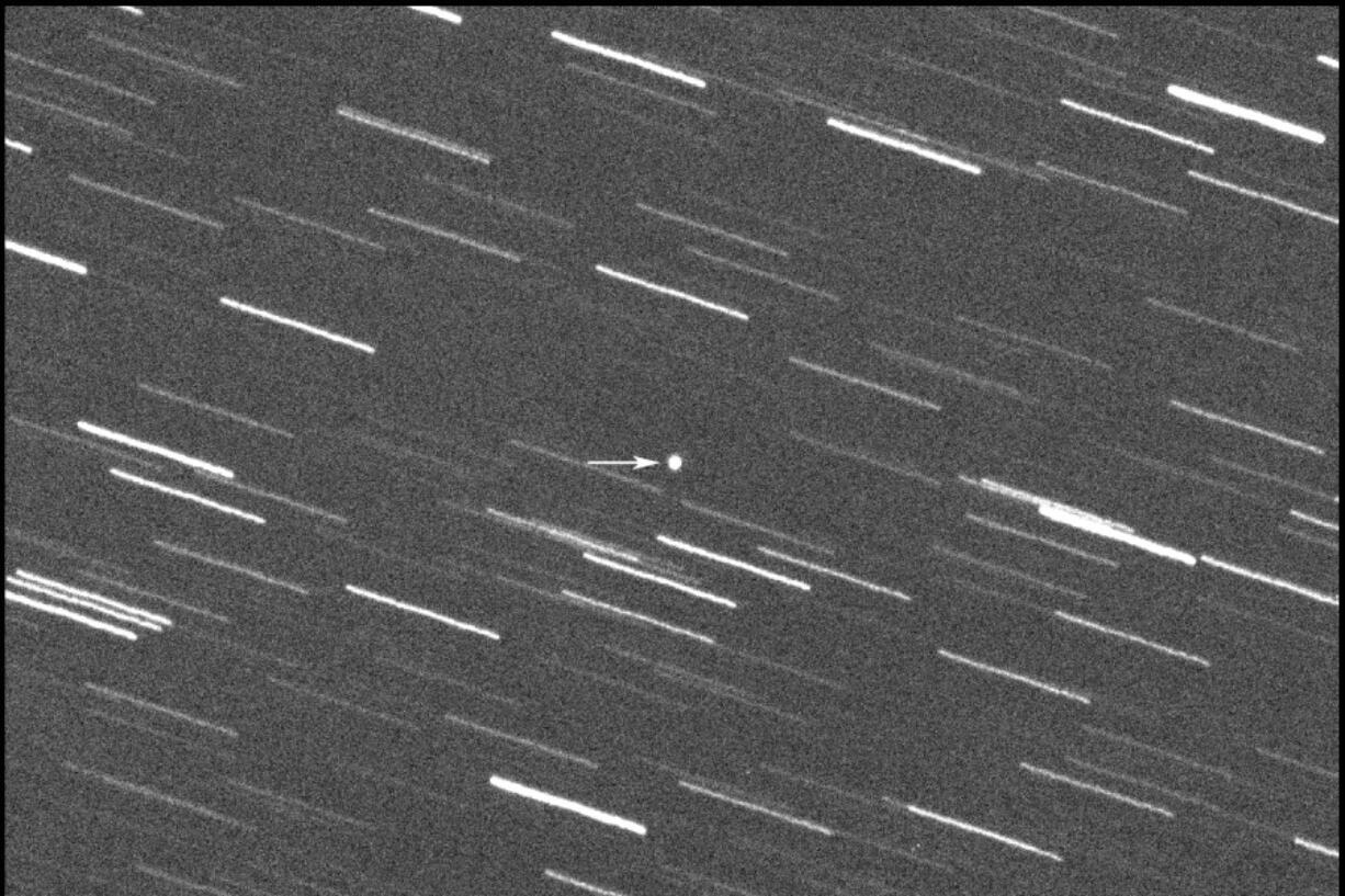 This image provided by Virtual Telescope Project out of Italy shows a single 180-second exposure asteroid that was approaching Earth, about 4 million kilometers, Thursday, Jan. 31, 2024.  Astronomers say an asteroid as big as a skyscraper will pass within 1.7 million miles of Earth on Friday. There&#039;s no chance of it hitting us since it will pass seven times the distance from Earth to the moon.
