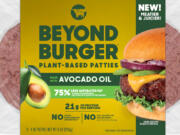 This image provided by Beyond Meat shows packaging for the latest iteration of the plant-based Beyond Burger. Beyond Meat, which has been struggling with falling U.S. demand, reformulated its burger to contain less fat and more protein. (Beyond Meat, Inc.