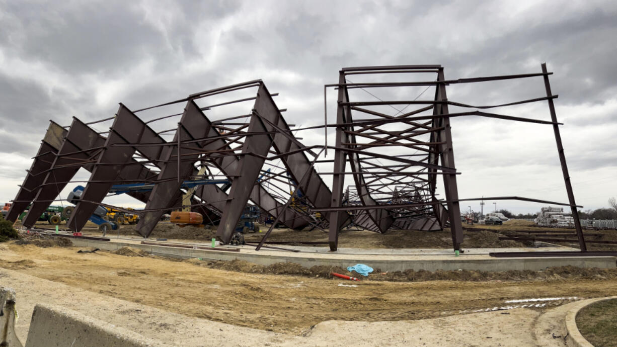 Twisted girders and debris cover the ground from a deadly structure collapse at a construction site near the Boise Airport on Thursday, Feb. 1, 2024 in Boise, Idaho.  Authorities responded Wednesday to the privately owned steel-framed hangar, which suffered a &ldquo;catastrophic&rdquo; collapse, Boise Fire Department Operations Chief Aaron Hummel said during an earlier news briefing.
