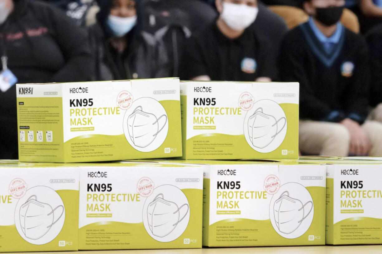 FILE - Boxes of KN95 protective masks are stacked together before being distributed to students at Camden High School in Camden, N.J., Wednesday, Feb. 9, 2022. A federal appeals court shot down claims that New Jersey residents&#039; refusal to wear face masks during the COVID-19 outbreak at school board meetings constituted protected speech under the First Amendment.  The 3rd Circuit Court of Appeals issued a ruling Monday, Feb. 5, 2024, in two related cases stemming from lawsuits against officials in Freehold and Cranford, N.J.