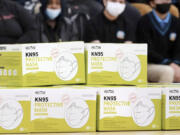 FILE - Boxes of KN95 protective masks are stacked together before being distributed to students at Camden High School in Camden, N.J., Wednesday, Feb. 9, 2022. A federal appeals court shot down claims that New Jersey residents&#039; refusal to wear face masks during the COVID-19 outbreak at school board meetings constituted protected speech under the First Amendment.  The 3rd Circuit Court of Appeals issued a ruling Monday, Feb. 5, 2024, in two related cases stemming from lawsuits against officials in Freehold and Cranford, N.J.