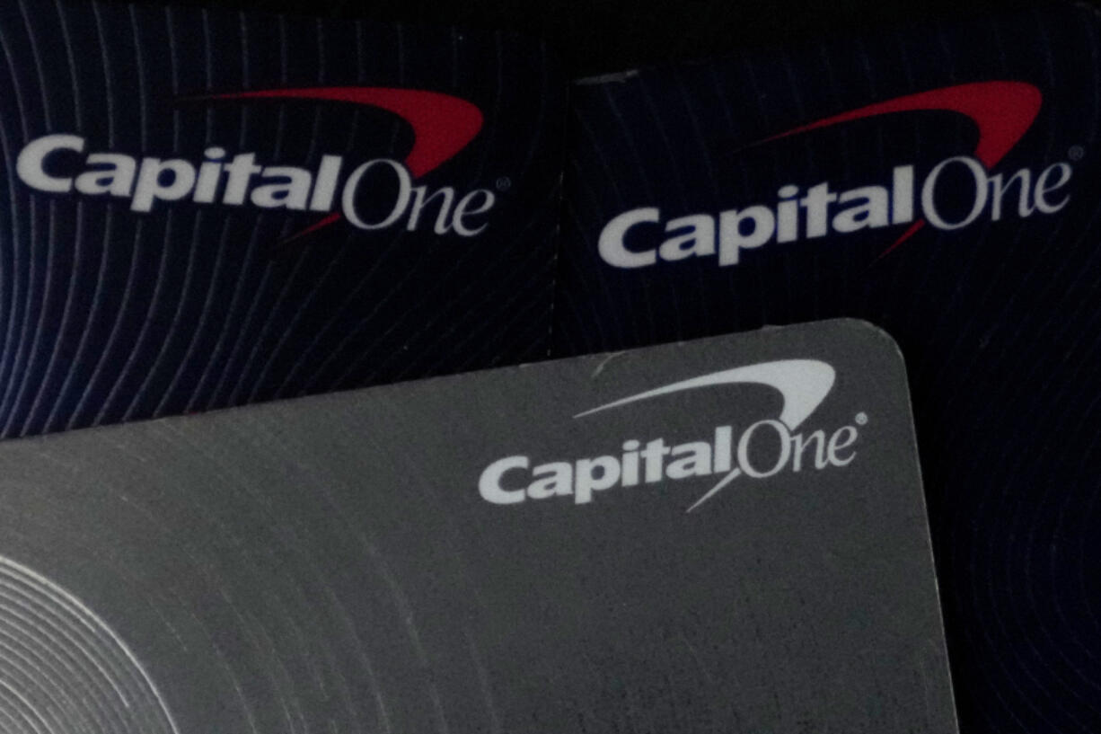 Capital One credit cards are shown in Mount Prospect, Ill., Tuesday, Feb. 20, 2024. Capital One Financial is buying Discover Financial Services for $35 billion, in a deal that would bring together two of the nation&rsquo;s biggest lenders and credit card issuers. (AP Photo/Nam Y.