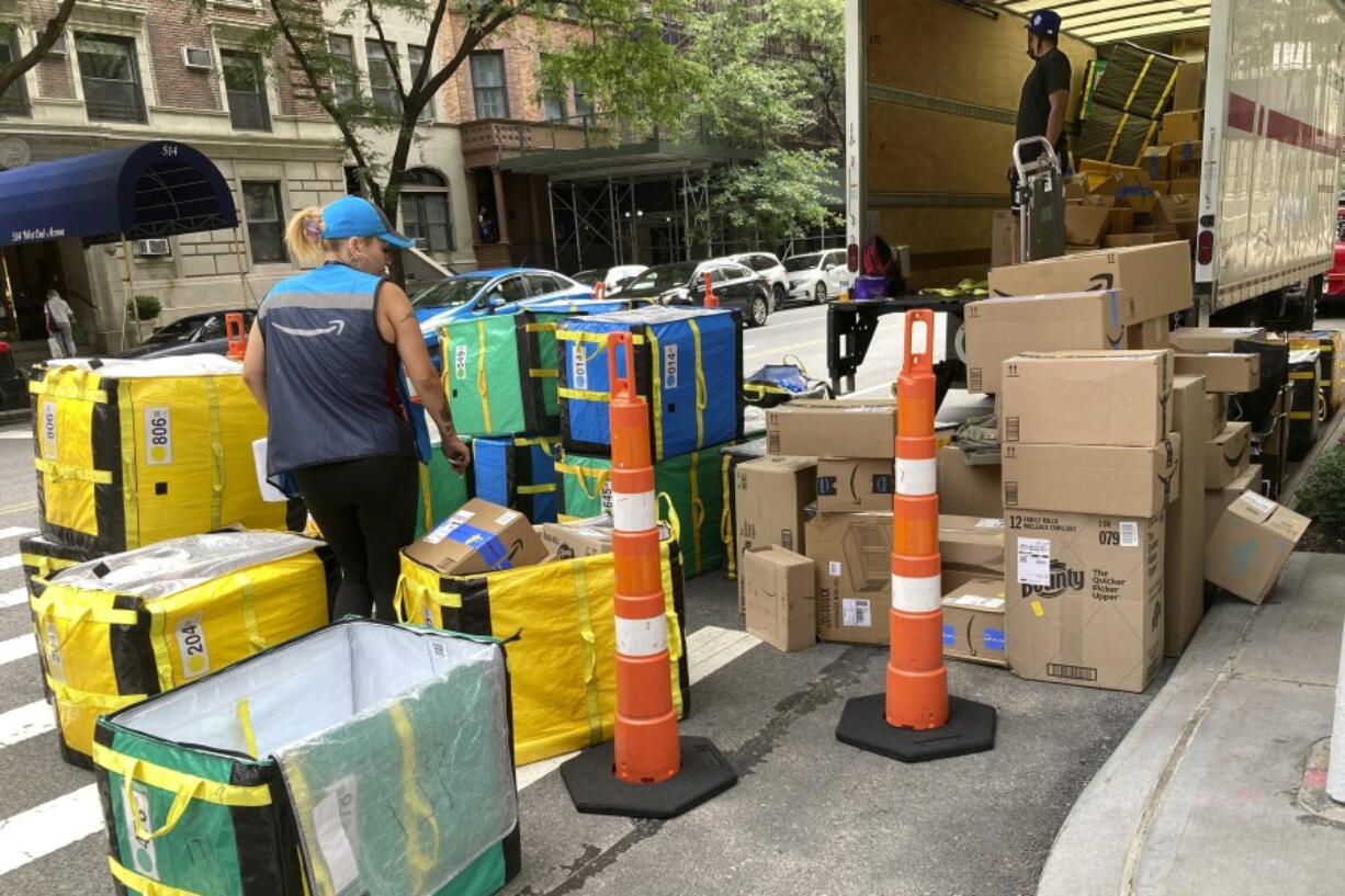 File - An Amazon truck is unloaded for deliveries on New York&rsquo;s Upper West Side, Aug. 14, 2023. Amazon releases results on Thursday, Feb. 1, 2024.
