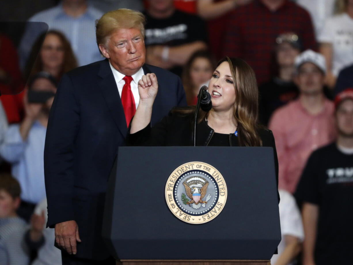 FILE - President Donald Trump listens as Republican National Committee chair Ronna McDaniel, right, speaks during a campaign rally Nov. 5, 2018, in Cape Girardeau, Mo. Trump is calling for a leadership change at the RNC in an attempt to install a new slate of loyalists, including his daughter-in-law, at the top of the GOP&#039;s political machine even before he formally secures the party&#039;s next presidential nomination. Trump outlined his plans on social media Monday night, Feb.