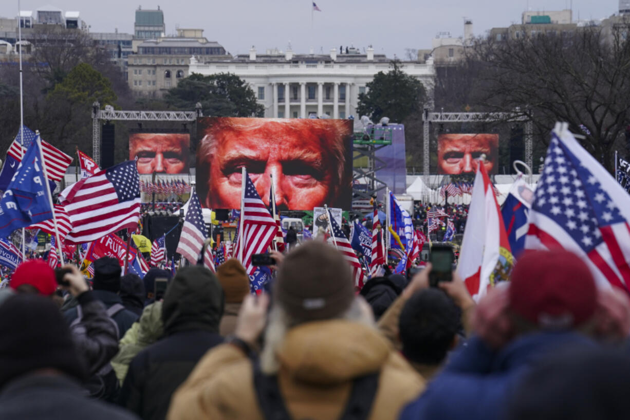 FILE - Trump supporters participate in a rally in Washington, Jan. 6, 2021, that some blame for fueling the attack on the U.S. Capitol. On Thursday, Feb. 8, the nation&rsquo;s highest court is scheduled to hear arguments in a case involving Section 3 of the 14th Amendment, which prohibits those who &ldquo;engaged in insurrection or rebellion&rdquo; from holding office. The case arises from a decision in Colorado, where that state&rsquo;s Supreme Court ruled that Trump violated Section 3 of the 14th Amendment and should be banned from ballot.