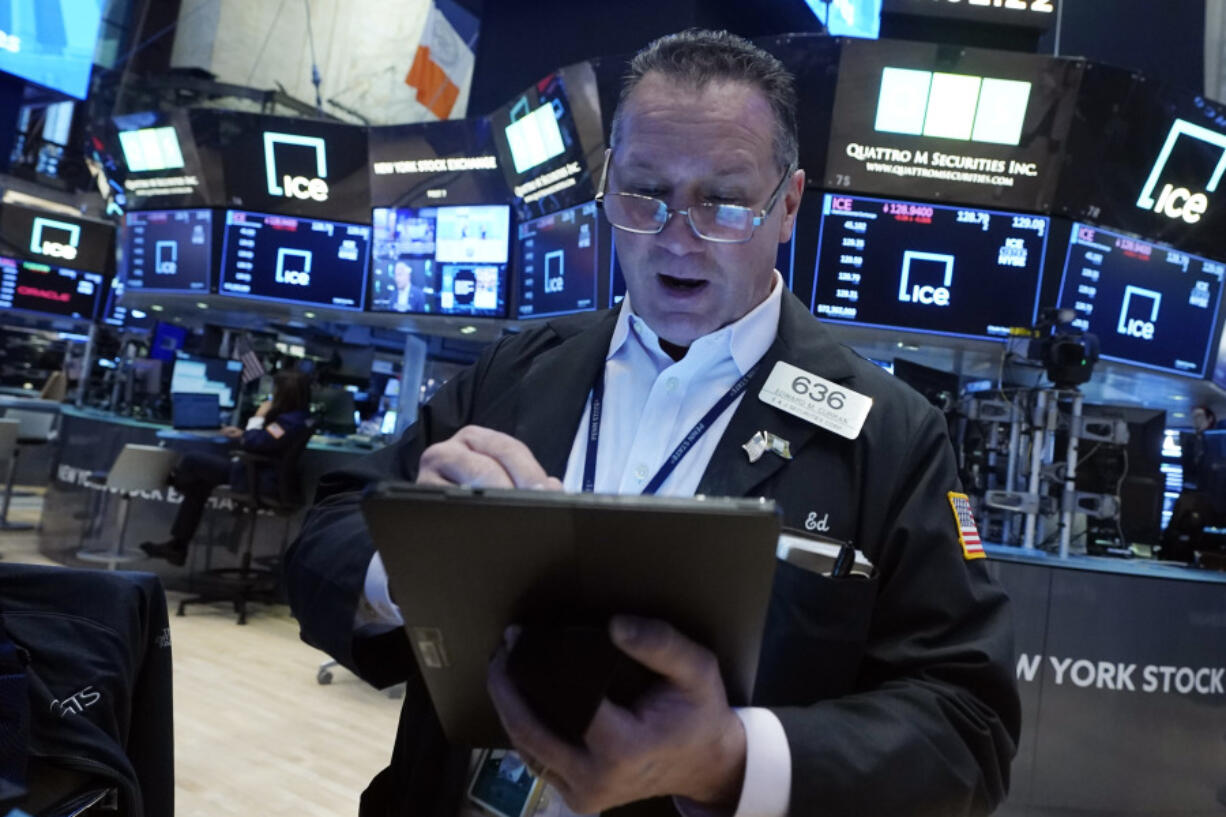 Trader Edward Curran works on the floor of the New York Stock Exchange, Wednesday, Jan. 31, 2024. Technology stocks are slumping Wednesday as several of Wall Street&rsquo;s most influential stocks feel the downside of ultrahigh expectations.