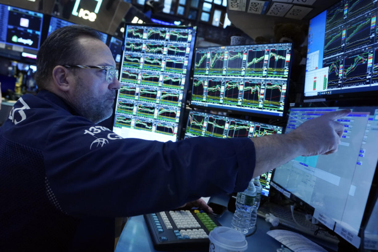 Specialist Anthony Matesic works at his post on the floor of the New York Stock Exchange, Wednesday, Jan. 31, 2024. Technology stocks are slumping Wednesday as several of Wall Street&rsquo;s most influential stocks feel the downside of ultrahigh expectations.
