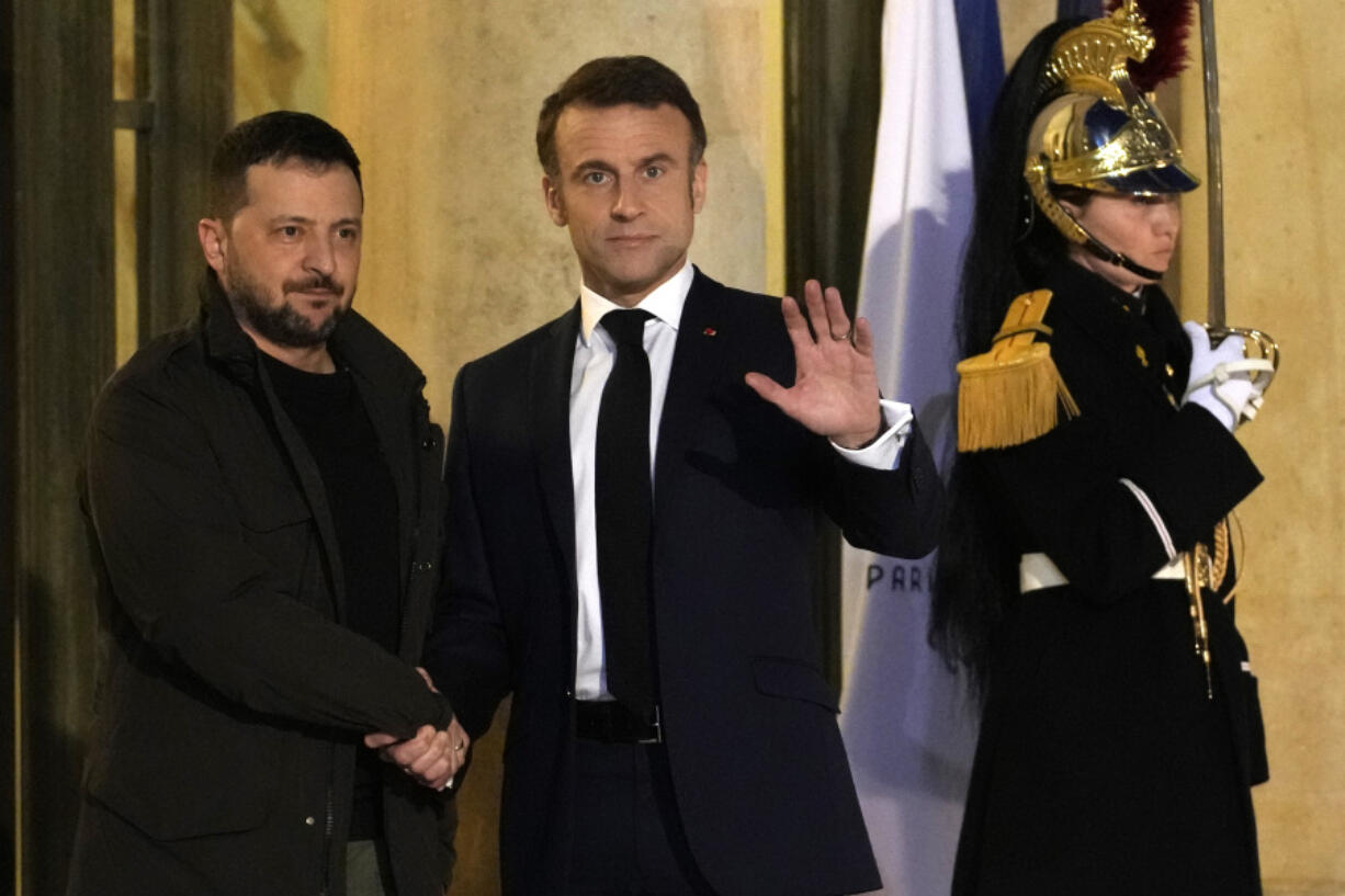 French President Emmanuel Macron, right, welcomes his Ukrainian counterpart, Volodymyr Zelenskyy Friday, Feb. 16, 2024 at the Elysee Palace in Paris. French President Emmanuel Macron will sign a bilateral security agreement with his Ukrainian counterpart, Volodymyr Zelenskyy to provide &ldquo;long-term support&rdquo; to the war-ravaged country which has been battling Russia&rsquo;s full-scale invasion for nearly two years.