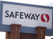 A sign is displayed outside a Safeway grocery store Wednesday, Feb. 14, 2024, in Denver. Colorado Attorney General Phil Weiser announced the filing of a lawsuit to block the Kroger/Albertsons merger on the basis of eliminating competition during a news conference Wednesday, in Denver.