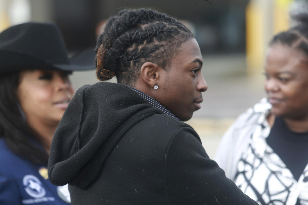 Darryl George, an 18-year-old high school junior, stands Jan. 24 outside a courthouse in Anahuac, Texas, following a court hearing over whether his Houston-area school district can continue to punish him for refusing to change his hairstyle.
