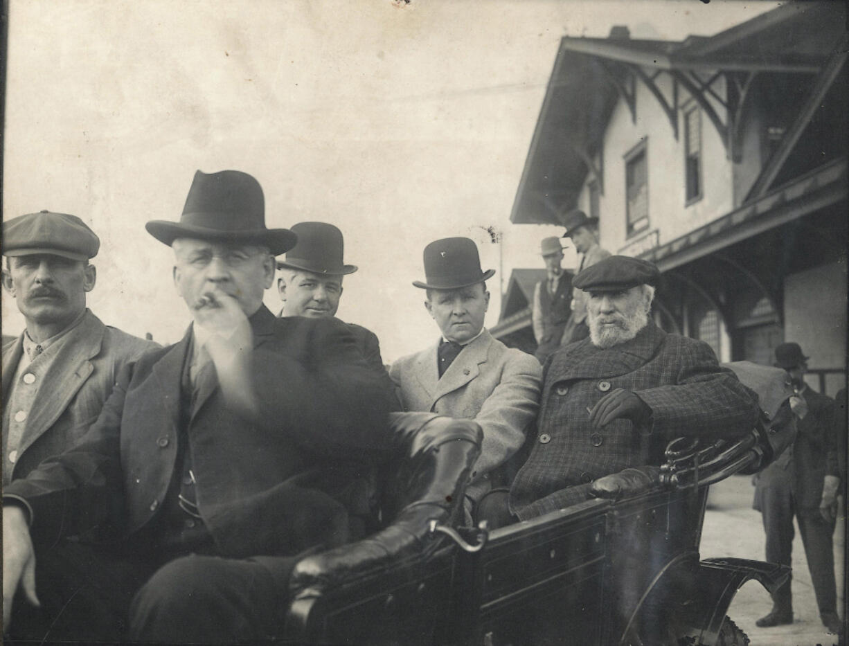 Railroad magnate James J. Hill, far right with beard, was the &ldquo;power behind the throne&rdquo; as Vancouver&rsquo;s local railway project struggled to grow, Gregg Herrington writes. Here, Hill is seen at Vancouver&rsquo;s downtown train station &mdash; where it still is today &mdash; in October 1911, accompanied by Vancouver Mayor John P. Kiggins, to his left.