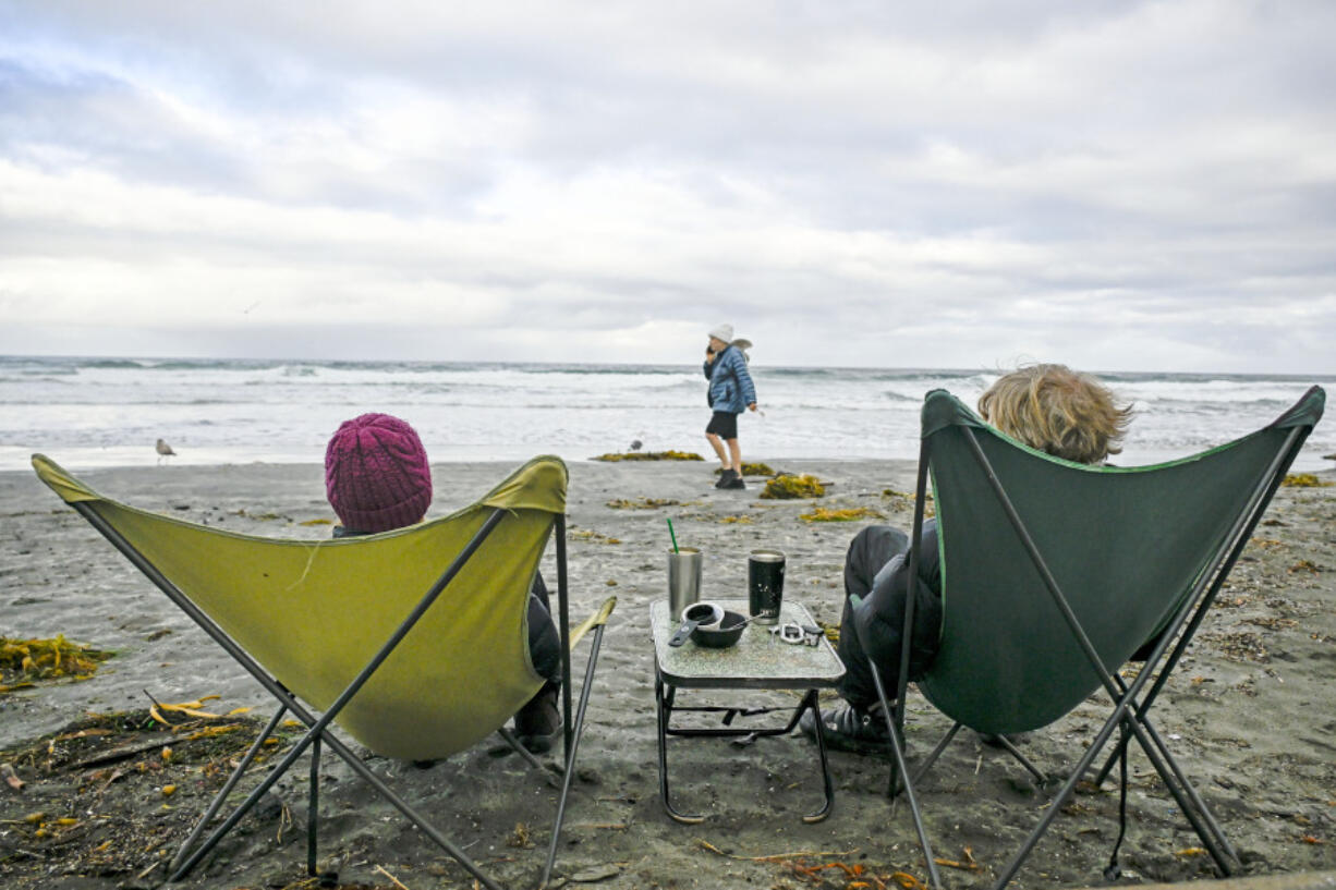 Residents watch the surf at La Jolla Shore in La Jolla, Calif., on Jan. 23.