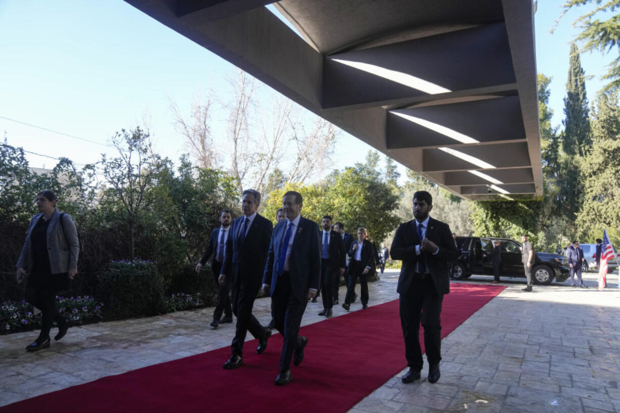 U.S. Secretary of State Antony Blinken, centre left, and Israel&rsquo;s President Isaac Herzog, centre right, walk during their meeting at the President&rsquo;s Residence in Jerusalem, Israel, Wednesday, Feb. 7, 2024.