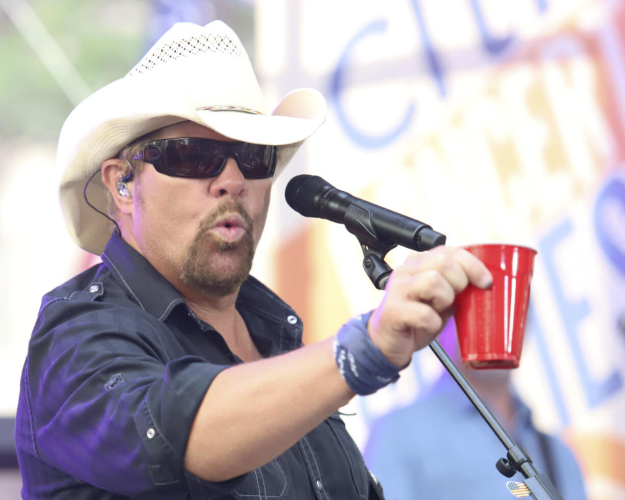 Country music recording artist Toby Keith holds a red Solo cup as he performs on NBC&rsquo;s Today show at Rockefeller Plaza on July 5, 2019, in New York. Keith, who died Feb.