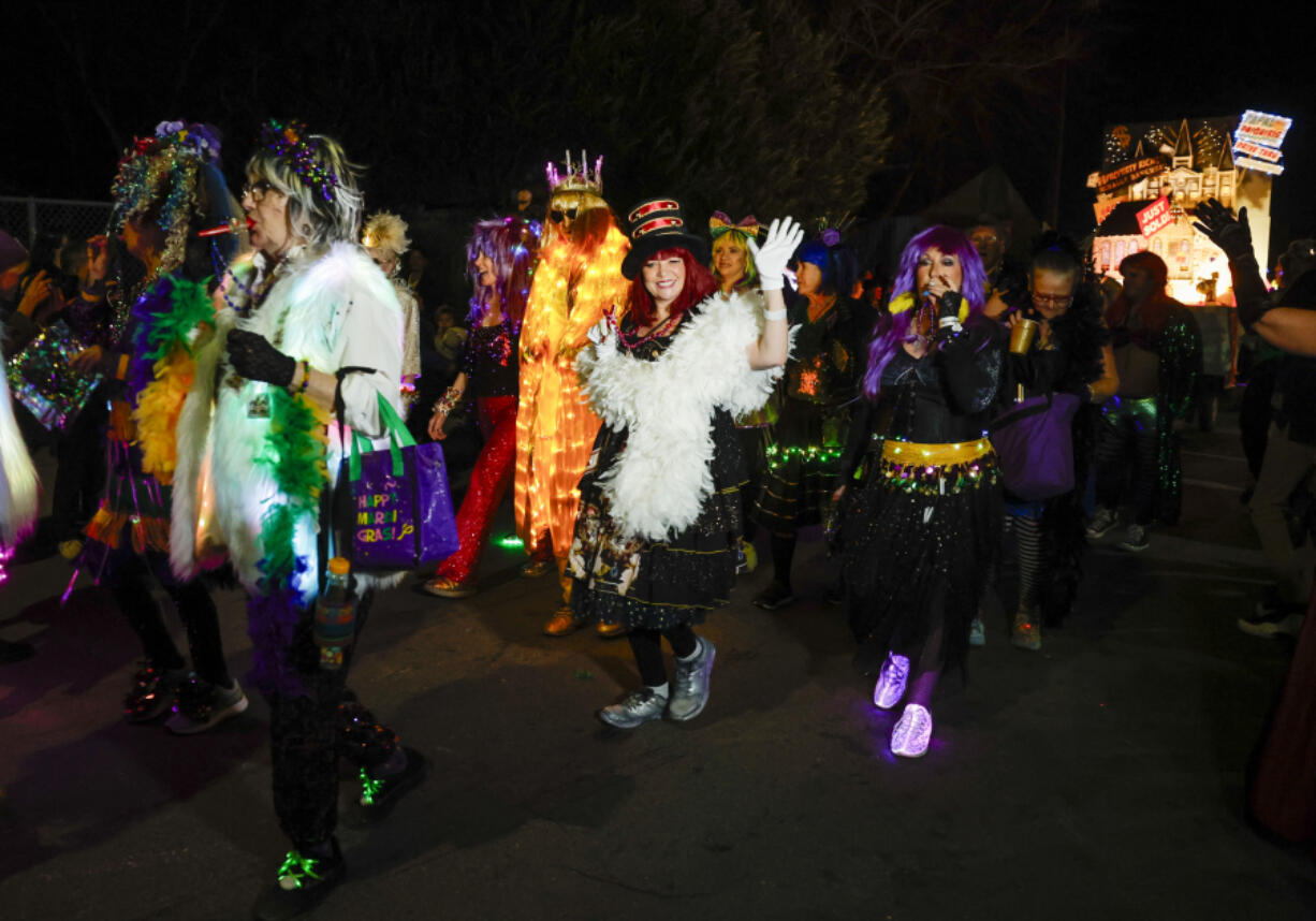 Krewe du Vieux parades through the Marigny neighborhood in New Orleans, Saturday, Jan. 27, 2024.