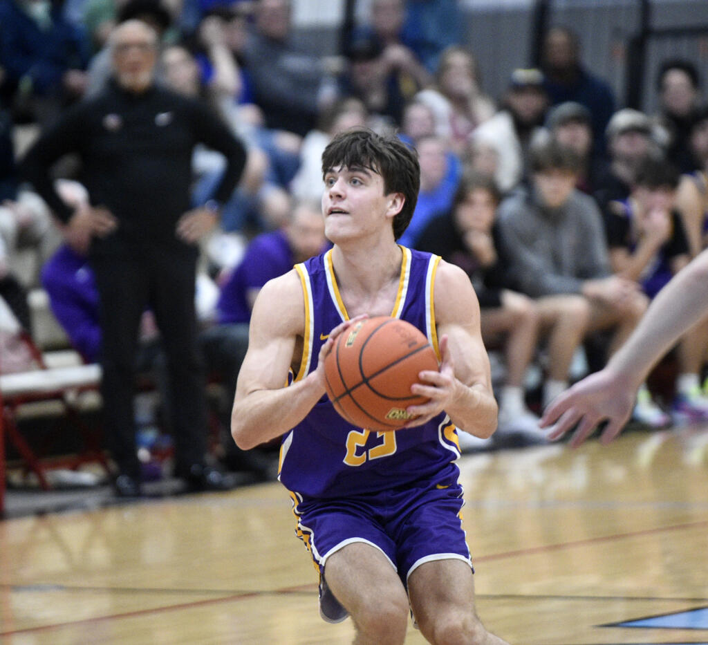Aaron Hoey of Columbia River pulls up to shoot against Mark Morris during a 2A Greater St. Helens League boys basketball game at Mark Morris High School in Longview on Saturday, Feb. 3, 2024.