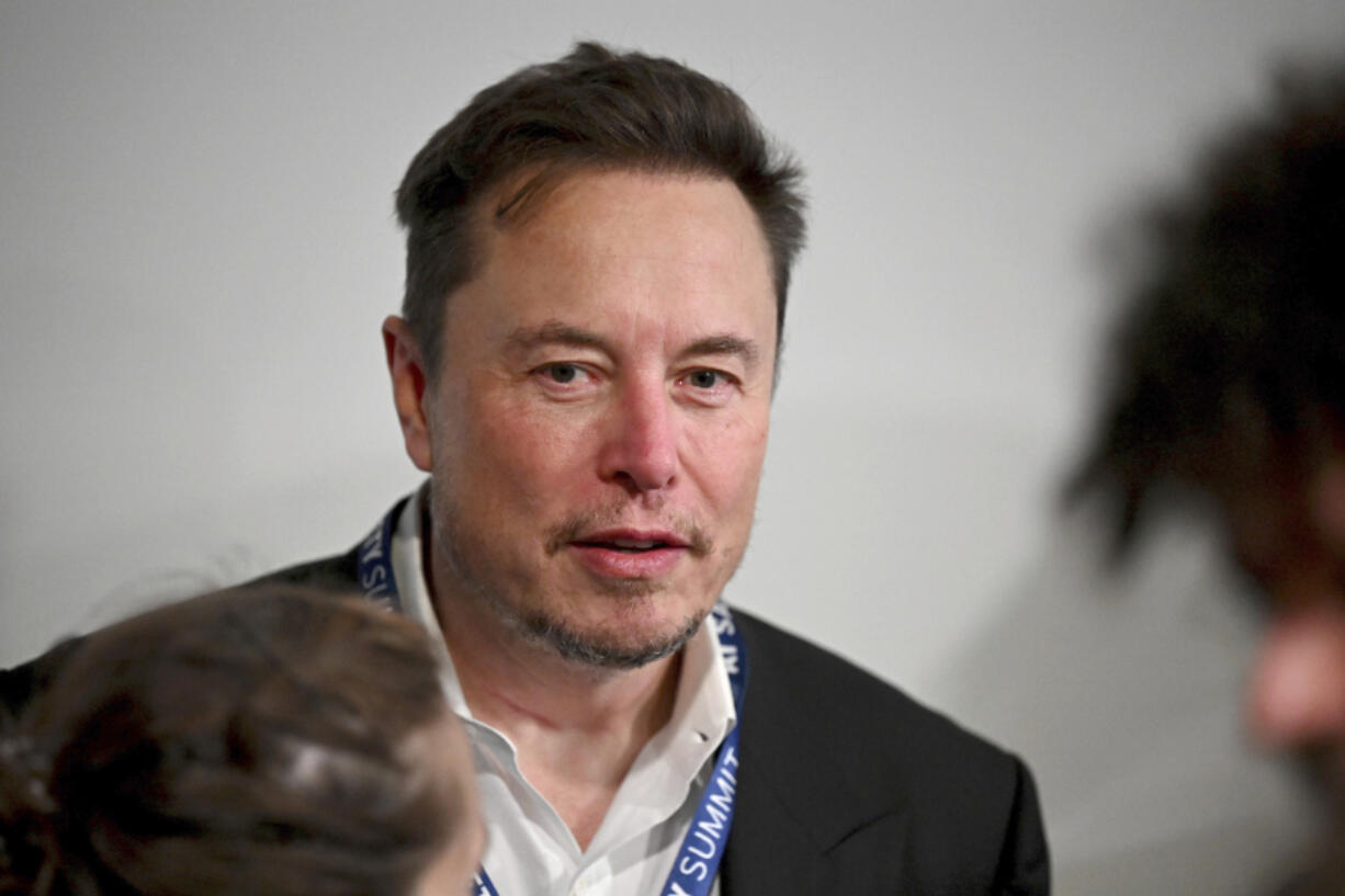 File - Tesla CEO Elon Musk attends the first plenary session of the AI Safety Summit at Bletchley Park, on Nov. 1, 2023 in Bletchley, England. A Delaware judge this week invalidated Elon Musk&rsquo;s $55.8 billion Tesla pay package, saying it is too big and that Musk set the terms with a complaint board.