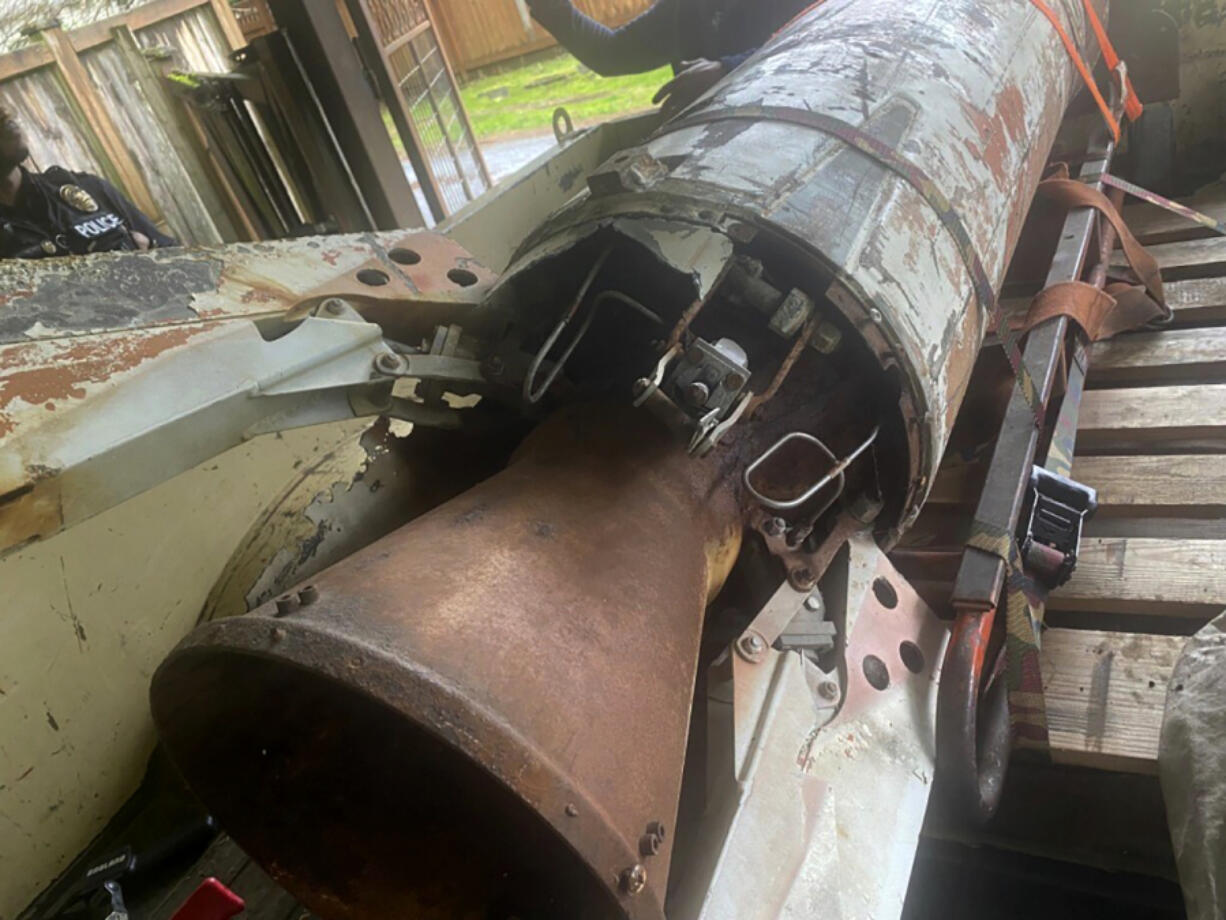 This image provided by Bellevue Police Department shows an inert rocket in the garage of a home in Bellevue on Thursday.  Bellevue police responded Thursday to a report of a military-grade rocket in the garage of a home of a deceased resident in the city across Lake Washington from Seattle.