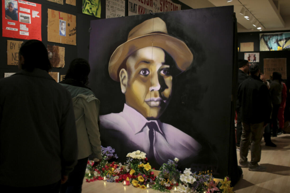 A painting of Emmett Till is displayed at a new exhibit, &ldquo;Twin Flames: The George Floyd Uprising from Minneapolis to Phoenix,&rdquo; at Arizona State University Art Museum, in Tempe, Arizona on Friday, Feb. 2, 2024. For months after George Floyd was killed by police in May 2020, people from around the world traveled to the site of his murder in Minneapolis and left signs, paintings and poems to memorialize the man whose death reignited a movement against systemic racism. Now hundreds of those artifacts are being displayed at an exhibit at the Arizona State University Art Museum.