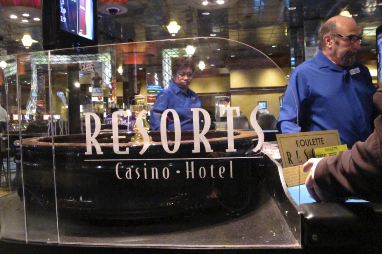 Dealers conduct a game of roulette at Resorts Casino in Atlantic City, N.J. on April 20, 2018. The Mohegan tribe will end its management of Atlantic City&rsquo;s Resorts casino at the end of this year, both parties said Monday, Feb. 26, 2024.