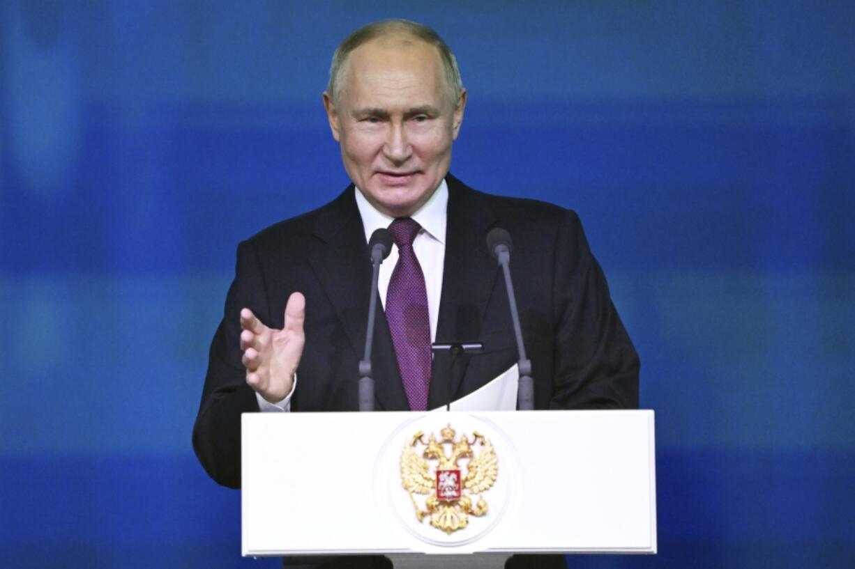 Russian President Vladimir Putin speaks during an event marking the 300th anniversary of the founding of the Russian Academy of Sciences at the State Kremlin Palace, in Russia, Thursday, Feb. 8, 2024.