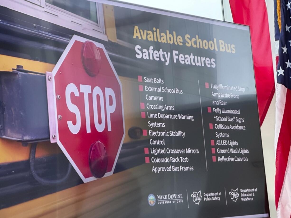 A list of school bus safety features recommended by a task force that Republican Gov. Mike DeWine convened after a deadly August 2023 crash is displayed at the Ohio Department of Public Safety in Columbus, Ohio, Wednesday, Jan. 31, 2024.
