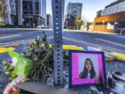 FILE - A photo of Jaahnavi Kandula is displayed with flowers, Jan. 29, 2023 in Seattle. Prosecutors in Washington state said Wednesday, Feb. 21, 2024, they will not file felony charges against the Seattle police officer who struck and killed the graduate student from India while responding to an overdose call.