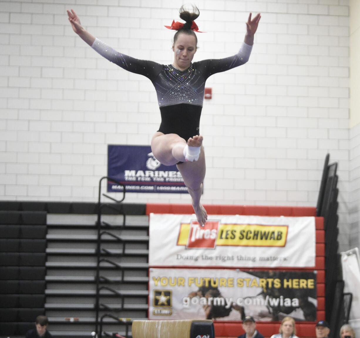 Union sophomore Carly Christ competes in the beam during the individual event finals at the 4A state gymnastics championships Friday, Feb. 23, 2024 in Bellevue.