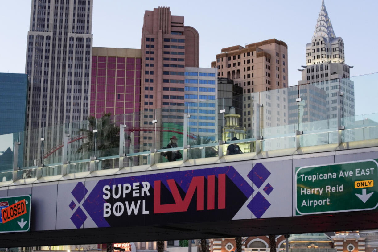 A sign for Super Bowl 58 adorns a pedestrian walkway across the Las Vegas Strip ahead of the Super Bowl, Tuesday, Jan. 30, 2024, in Las Vegas.
