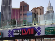 A sign for Super Bowl 58 adorns a pedestrian walkway across the Las Vegas Strip ahead of the Super Bowl, Tuesday, Jan. 30, 2024, in Las Vegas.