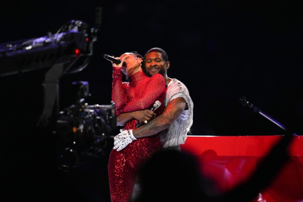 Usher and Alicia Keys perform during halftime of the NFL Super Bowl 58 football game between the San Francisco 49ers and the Kansas City Chiefs on Sunday, Feb. 11, 2024, in Las Vegas.