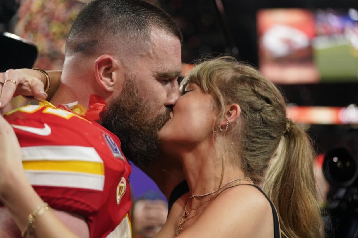 Taylor Swift kisses Kansas City Chiefs tight end Travis Kelce after the NFL Super Bowl 58 football game against the San Francisco 49ers on Sunday in Las Vegas.