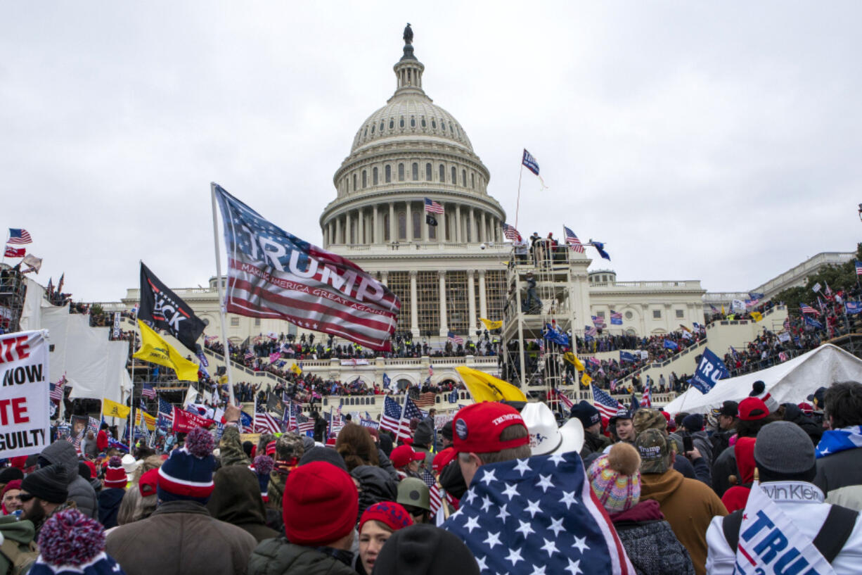 FILE - Insurrections loyal to President Donald Trump at the U.S. Capitol in Washington on Jan. 6, 2021. All eyes are on the Supreme Court in Donald Trump&rsquo;s federal 2020 election interference case.