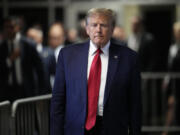 Former President Donald Trump leaves Manhattan criminal court, Thursday, Feb. 15, 2024, in New York. A New York judge says Trump&rsquo;s hush-money trial will go ahead as scheduled with jury selection starting on March 25.