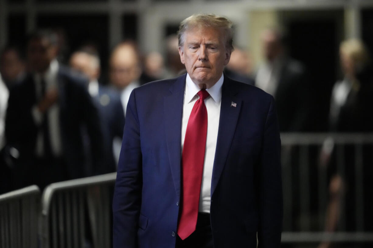 Former President Donald Trump leaves Manhattan criminal court, Thursday, Feb. 15, 2024, in New York. A New York judge says Trump&#039;s hush-money trial will go ahead as scheduled with jury selection starting on March 25.