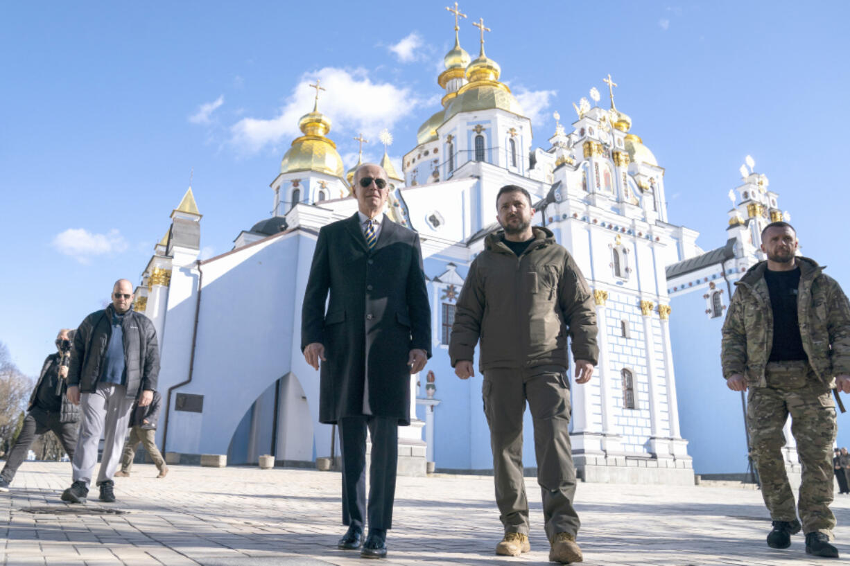 FILE &ndash; U.S. President Joe Biden walks with Ukrainian President Volodymyr Zelenskyy in Kyiv, Ukraine, Monday, Feb. 20, 2023. As chances rise of a Biden-Donald Trump rematch in the U.S. presidential election race, America&rsquo;s allies are bracing for a bumpy ride, with concerns rising that the U.S. could grow less dependable regardless of who wins.