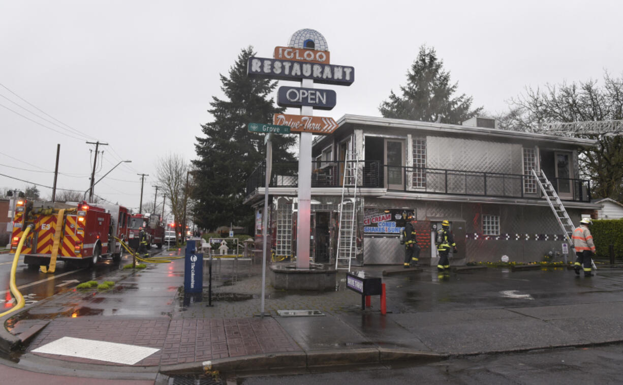 The Vancouver Fire Department works to put out a fire at the Igloo Restaurant in Vancouver on March 13, 2017.