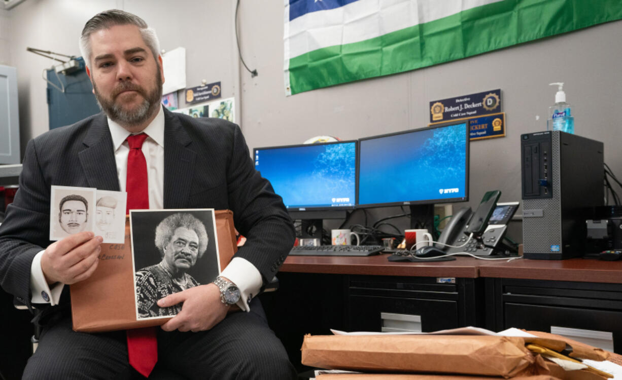 Cold Case Squad Det. Robert J. Deckert poses with a photograph of Frederick Wilkerson, right, and the New York Police Department&rsquo;s sketches of the persons of interest in his 1980 murder in the UWS on Feb. 28, 2024, in the Bronx borough of New York City.