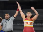 Prairie junior Faith Tarrant, right, celebrates winning the 3A/4A 235-pound championship Saturday, Feb. 17, 2024, during the Mat Classic state wrestling tournament at Tacoma Dome.