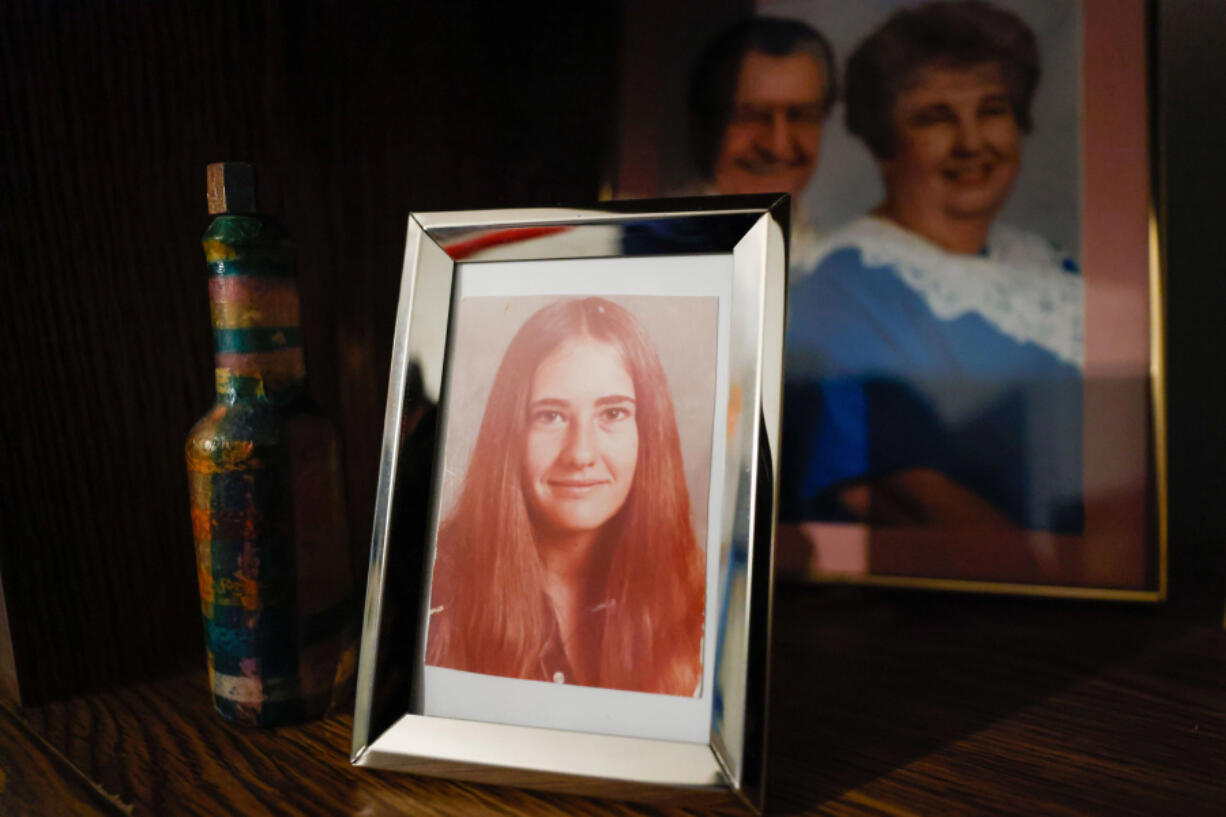 A photograph of Carlene Tengelsen sits a bookshelf in her sister&rsquo;s house.