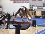 Camas senior Hallie Kempf competes in the vault at the Class 4A state gymnastics championships on Friday, Feb. 22, 2024 at Sammamish High School in Bellevue.